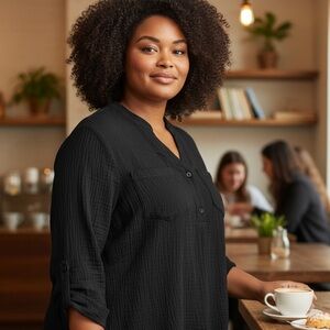 Woman’s Vintage Venezia black blouse.